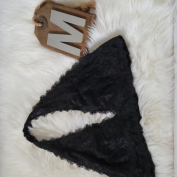 Sheer black lace bralette with adjustable hook and eye closure - Picture 1 of 11